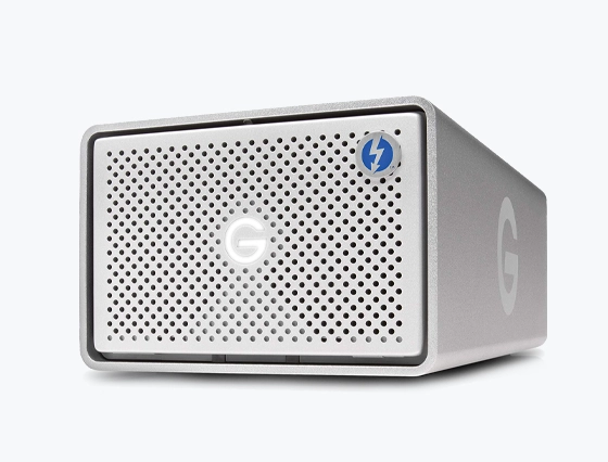 Silver G-Technology external storage device with a perforated front panel and a blue Thunderbolt logo on the top right corner